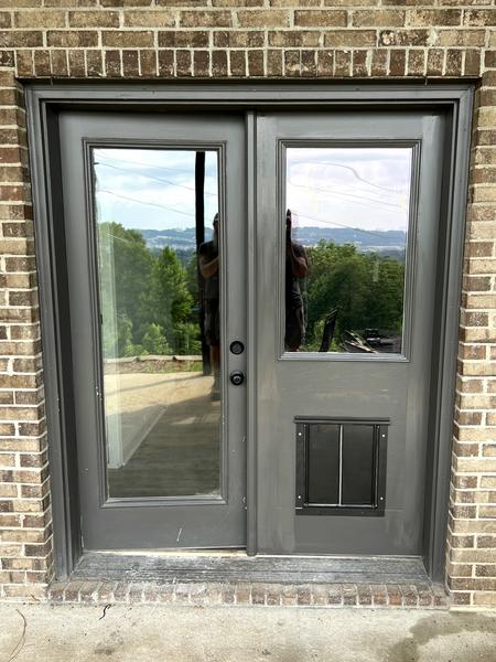 Custom panel dark gray French door — exterior